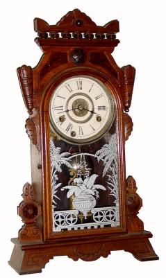 C.1880, New Haven, NEVA, walnut parlor clock in good restored condition. The case has been attractively refinished. — Antique Clocks Price Guide