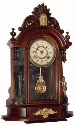 C.1900, Ansonia Clock Co., New York. 8-day "Triumph" model solid mahogany mantel clock with gong striking. — Antique Clocks Price Guide