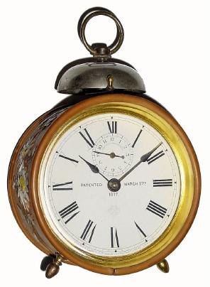 C.1890, Ansonia, Rare 1-Day Alarm in Marbelite case with molded flowers on the sides of the case. — Antique Clocks Price Guide