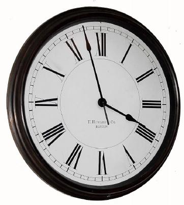 C.1920, E. Howard and Co., Boston, a large bronze bezel slave clock with 16" signed dial. — Antique Clocks Price Guide