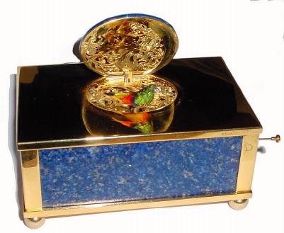 C.1975, Swiss, Reuge Music Co, St. Croix, singing bird box in an imitation lapis and gold plated case. — Antique Clocks Price Guide