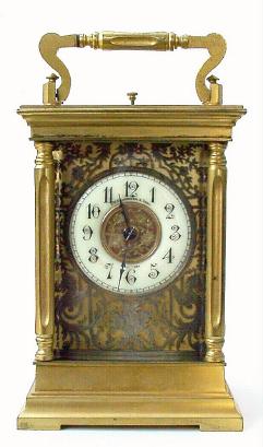 C.1900, French, Brass Cased Carriage Clock, time, strike and repeat, the column case with an engraved and silvered overlay mask surrounding the dial. — Antique Clocks Price Guide