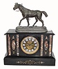 C.1892, Ansonia, Black Marble mantel clock with No. 1118 Thoroughbred clock topper, the whole in good original condition.