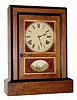 C.1870, Jerome and Co., (New Haven) , 8-day mahogany cottage clock with guttu purcha or thermo-plastic inserts in the door,