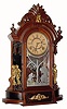 C.1891, William L. Gilbert Clock Co., "Occidental", 8-day time/strike walnut mantel clock, with some restoration.