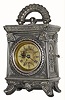 C.1890, Parker and Whipple, Meriden, Ct, Hotchkiss patent 30 hour timepiece in a cast white metal case with Egyptian motif.