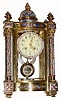C.1905, French, Fancy Crystal regulator with profuse enamelling, and with brilliant sash and pendulum.