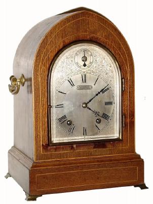 C.1905, German, Winterhalder & Hofmeier, for J. E. Caldwell, Philadelphia, quarter striking lancet top mantel clock, with engraved silvered dial, in fair to good condition. — Antique Clocks Price Guide