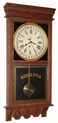 C.1918, E. Ingraham & Co., "NORTHWESTERN", time & calendar store regulator in good original condition. — Antique Clocks Price Guide