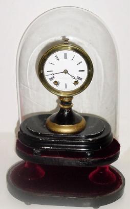 C.1870, Seth Thomas Sons & Co., New York, 8-day candle stick timepiece, on sub base with old dome (larger than original). — Antique Clocks Price Guide