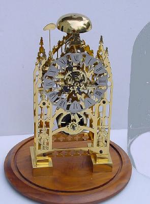 Mid 20th Century, English, Passing Strike Skeleton clock in a cathedral style frame. — Antique Clocks Price Guide