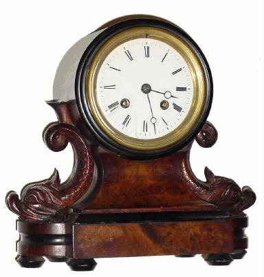 C.1890, French, walnut and ebonized, carved wood mantel clock 8-day time/strike in good condition with an original finish. — Antique Clocks Price Guide