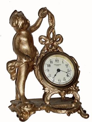 C.1900, New Haven Clock Co., "Eldora", 30-hour, cast white metal, novelty timepiece. — Antique Clocks Price Guide
