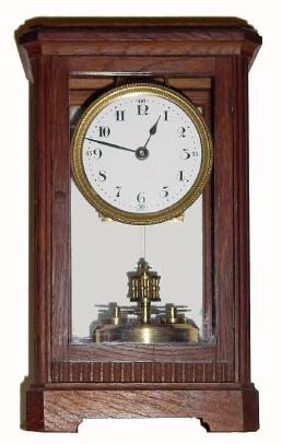 C.1912, Kienzle Clock Factories, Huber Uhren, 400-day timepiece in a well made oak 4-glass case with a flat finish and disc pendulum. — Antique Clocks Price Guide