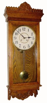 C.1905, Waterbury Clock Co., "Postal", oak wall regulator, 8-day time and strike and in excellent condition, — Antique Clocks Price Guide