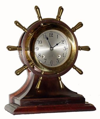 C.1983, Chelsea Clock Co., "Mariner", 8-day ship's bell clock in brass & bronze finish, & in excellent original condition — Antique Clocks Price Guide