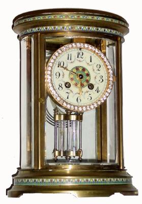 C.1900, Marti & Cie, Oval crystal regulator, 8-day T/S, in very nice condition with a fully intact brilliant surround dial and enamel decorations. — Antique Clocks Price Guide