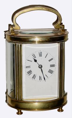 C.1900, French, Brass Cased Carriage Clock, Time & Strike, in an Oval case, with blemishes. — Antique Clocks Price Guide