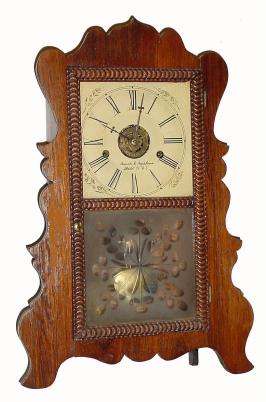 C.1852, E. & A. Ingraham, Bristol, Conn., 30-hour time/strike scroll front shelf clock. — Antique Clocks Price Guide