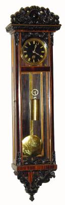 C.1975, Austrian, Repro Mini "6-light" weight regulator with black dial. This clock precedes the C.2000 reproductions coming from Hungary and the Czech republic, by a good 25 years. — Antique Clocks Price Guide