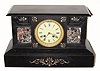C.1895, French, Black marble & brown onyx mantel clock with original jeweled lever platform, spanning the plates at top.