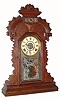 C.1911, E. Ingraham Clock Co., "Ducat", 8-day time/strike/alarm oak gingerbread clock in very nice condition