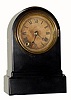 C.1875, Terry Clock Co., Waterbury, Conn., 8-day iron case timepiece. The black enamel has been rubbed down and all the design is absent.