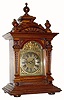 C.1920, German, Junghans, 8-day bracket clock in walnut in excellent original condition with original finials. 