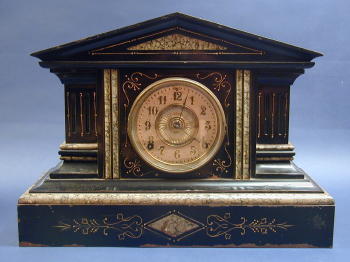 AN AMERICAN EBONIZED AND MARBLIZED CAST IRON MANTLE CLOCK, 19th century, mechanism stamped 'ANSONIA CLOCK/U.S.A./NEW YORK' — Antique Clocks Price Guide