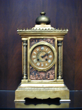 A FRENCH PARCEL-GILT AND COPPERED BRONZE MANTEL CLOCK, Late 19th century, the works by Japy Freres. — Antique Clocks Price Guide