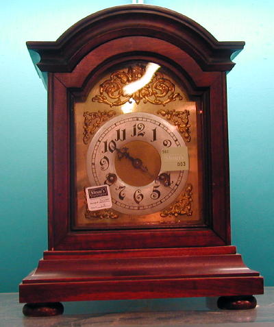 A GERMAN WALNUT CASED MANTLE CLOCK. Late 19th/early 20th c. — Antique Clocks Price Guide