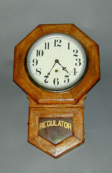 A SETH THOMAS OAK REGULATOR CLOCK. — Antique Clocks Price Guide