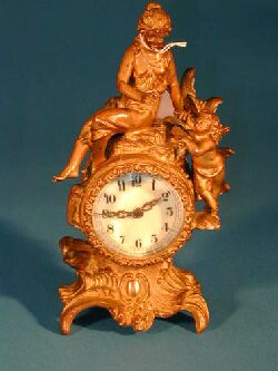 A 19TH CENTURY FIGURAL SHELF CLOCK, Works marked New Haven Clock Co. — Antique Clocks Price Guide