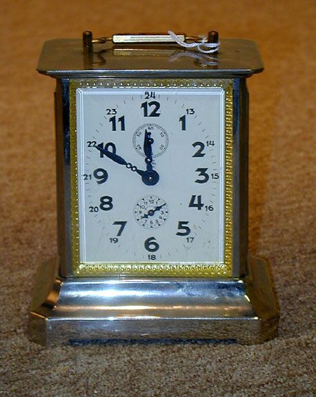 A JUNGHANS CHROME AND BRASS CARRIAGE CLOCK, — Antique Clocks Price Guide