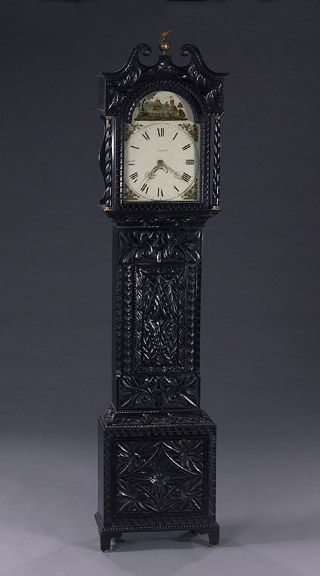 A JACOBEAN REVIVAL CARVED AND EBONISED WALNUT LONGCASE CLOCK, 19th century. — Antique Clocks Price Guide