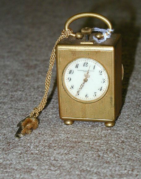 A SWISS GILT METAL SMALL CARRIAGE CLOCK, the works stamped Breve, the face inscribed Vacheron & Constantin, Geneva. — Antique Clocks Price Guide