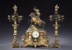 A FRENCH PATINATED AND PARCEL GILT BRONZE AND ONYX THREE-PIECE CLOCK GARNITURE, late 19th century. — Antique Clocks Price Guide