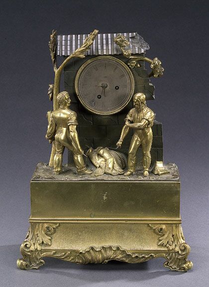 A CHARLES X GILT AND PATINATED BRONZE FIGURAL MANTEL CLOCK, circa 1830, unmarked. — Antique Clocks Price Guide