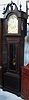 A TALL CASE CLOCK. With tube chimes. Manufactured by "The Herschede Hall Clock Co., Cincinnati, Ohio".