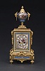 AN ORMOLU-MOUNTED 'SEVRES' PORCELAIN MANTEL CLOCK, 19th century, works stamped 'B.R.'/271/38100' and plinth stamped '38100' at back.