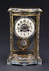 A FRENCH CHAMPLEVE ENAMEL AND GILT BRASS MANTEL CLOCK, early 20th century, the works stamped Japy Freres.