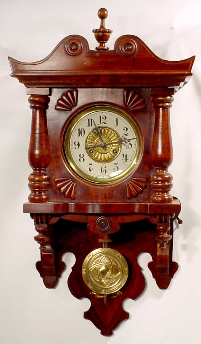 Junghans dark mixed wood — Antique Clocks Price Guide