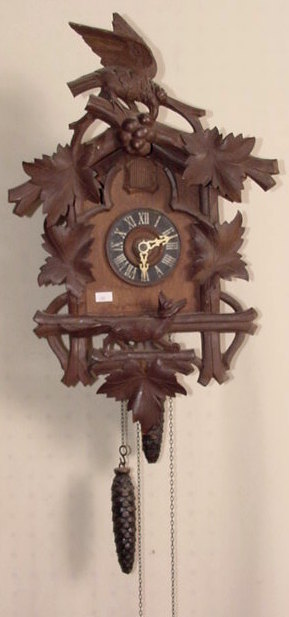 Carved mixed wood — Antique Clocks Price Guide