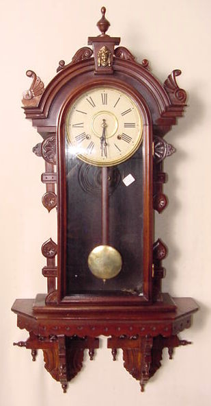 Gilbert Victorian walnut wall clock — Antique Clocks Price Guide