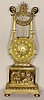 Brass lyre shaped table clock