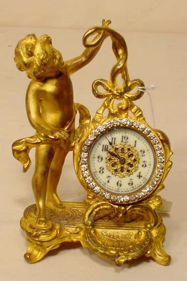 New Haven figural desk clock: — Antique Clocks Price Guide