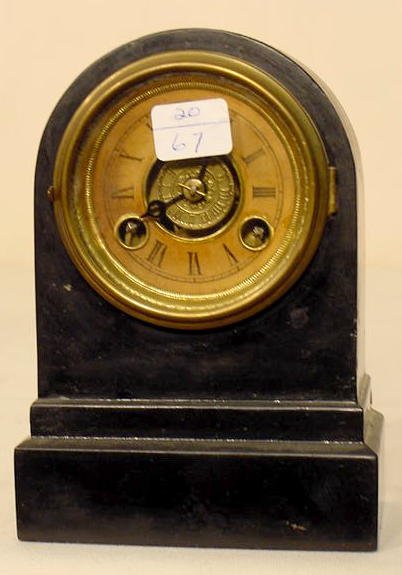 Early Terry iron case alarm clock: — Antique Clocks Price Guide