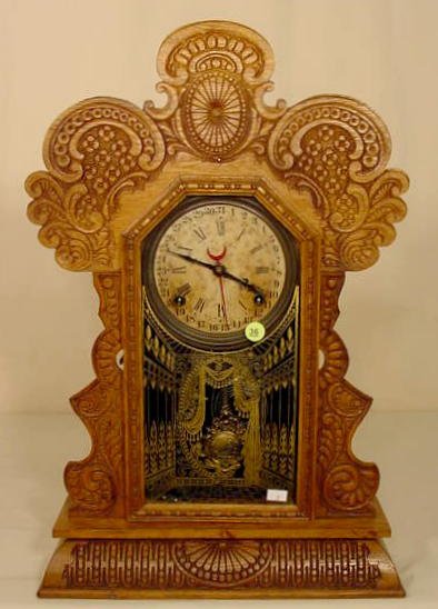 Ingraham Gila oak parlor calendar clock: — Antique Clocks Price Guide
