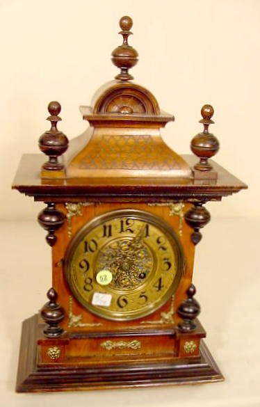 Walnut & mixed wood bracket style clock: — Antique Clocks Price Guide