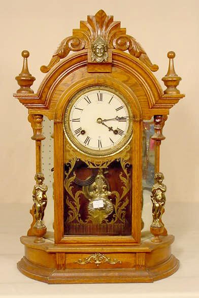 Waterbury mirror side clock: — Antique Clocks Price Guide